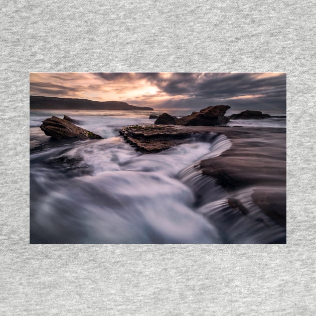 Water flowing over the rocks at Killcare Beach on NSW Central Coast by Geoff79